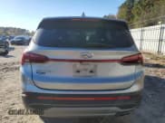 ✅ 2021 Hyundai Santa Fe SE • VIN: 5NMS14AJXMH330318 • Lot: 91399745. Listed on Copart with 139,874 mi. Free auction sales archive from the USA and detailed vehicle history report at DreamBid. Image 6.