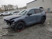 ✅ 2022 Mazda CX-5 S Carbon Edition • VIN: JM3KFBCM6N1521752 • Lot: 90551615. Wystawiony na Copart z przebiegiem 59 317 mil. Bezpłatny archiwum sprzedaży aukcyjnych z USA i szczegółowy raport historii pojazdu na DreamBid. Zdjęcie 1.