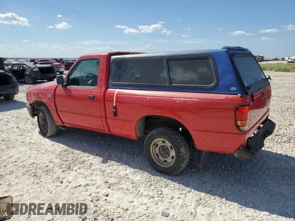 ✅ 1994 Mazda B-Series • VIN: 4F4CR12AXRTN07635 • Lot: 66788284. Listed on Copart with 255,020 mi. Free auction sales archive from the USA and detailed vehicle history report at DreamBid. Image 2.