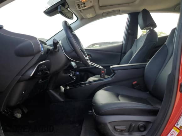 2021 Toyota Prius L Eco with VIN JTDKAMFU9M3134940, listed as a Copart auction lot 71632875 with 34,382 mi miles and Salvage title. Bid and sale history available at DreamBid. Image 7.