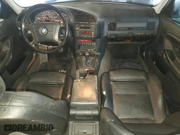 1997 BMW 3 Series z VIN WBACD3325VAV21116, wystawiony jako Copart lot #82164394 z przebiegiem 172 704 mil mil oraz Czysty tytuł • Clean title. Historia ofert i sprzedaży dostępna na DreamBid. Obrazek 8.