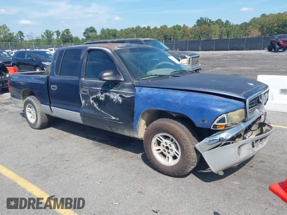 ✅ 2000 Dodge Dakota Sport • VIN: 1B7GL2AX8YS783520 • Lot: 43277615. Listed on IAAI with 303,682 mi. Free auction sales archive from the USA and detailed vehicle history report at DreamBid. Image 1.