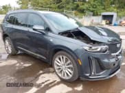 ✅ 2021 Cadillac XT6 Sport • VIN: 1GYKPGRS2MZ200990 • Lot: 43315638. Listed on IAAI with 104,071 mi. Free auction sales archive from the USA and detailed vehicle history report at DreamBid. Image 1.