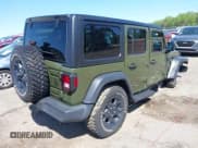 ✅ 2023 Jeep Wrangler Sport S • VIN: 1C4HJXDN0PW695795 • Lot: 41974691. Listed on IAAI with 32,734 mi. Free auction sales archive from the USA and detailed vehicle history report at DreamBid. Image 4.