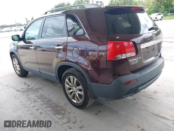 ✅ 2011 Kia Sorento EX • VIN: 5XYKU4A28BG054812 • Лот: 43136079. Опубликован ранее на IAAI с пробегом 199 719 миль. Бесплатный доступ к архиву аукционных продаж из США и подробный отчёт об истории автомобиля на DreamBid. Изображение 3.