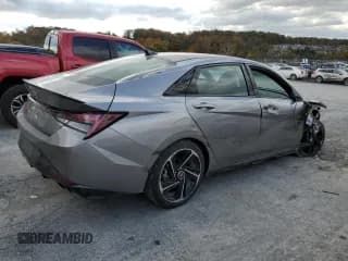 ✅ 2022 Hyundai Elantra N Line • VIN: KMHLR4AF9NU341177 • Lot: 87230065. Listed on Copart with 76,654 mi. Free auction sales archive from the USA and detailed vehicle history report at DreamBid. Image 3.