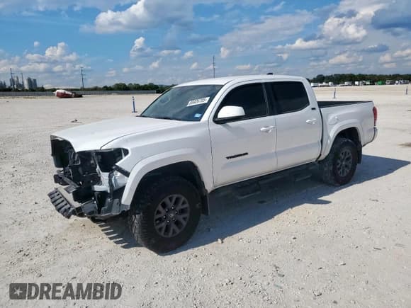 ✅ 2023 Toyota Tacoma SR5 • VIN: 3TYAZ5CN8PT041924 • Lot: 85926705. Listed on Copart with 34,678 mi. Free auction sales archive from the USA and detailed vehicle history report at DreamBid. Image 1.