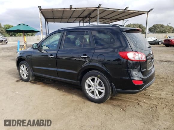 ✅ 2011 Hyundai Santa Fe Limited • VIN: 5XYZK4AG2BG002723 • Lot: 76418934. Listed on Copart with 123,592 mi. Free auction sales archive from the USA and detailed vehicle history report at DreamBid. Image 2.