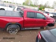 ✅ 2024 GMC Canyon 4WD AT4 • VIN: 1GTP6DEK5R1152863 • Лот: 42114275. Опубликован ранее на IAAI с пробегом 21 584 миль. Бесплатный доступ к архиву аукционных продаж из США и подробный отчёт об истории автомобиля на DreamBid. Изображение 13.