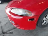 ✅ 1999 Mitsubishi Eclipse RS • VIN: 4A3AK34Y5XE085606 • Lot: 41583304. Wystawiony na IAAI z przebiegiem 277 195 mil. Bezpłatny archiwum sprzedaży aukcyjnych z USA i szczegółowy raport historii pojazdu na DreamBid. Zdjęcie 6.