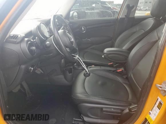 ✅ 2015 MINI Hardtop 4 Door • VIN: WMWXS5C55FT833827 • Lot: 50588915. Wystawiony na Copart z przebiegiem 64 949 mil. Bezpłatny archiwum sprzedaży aukcyjnych z USA i szczegółowy raport historii pojazdu na DreamBid. Zdjęcie 7.