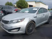 ✅ 2013 Kia Optima LX • VIN: KNAGM4A75D5430974 • Lot: 41209055. Listed on IAAI with 197,871 mi. Free auction sales archive from the USA and detailed vehicle history report at DreamBid. Image 2.