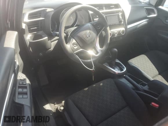 ✅ 2015 Honda Fit LX • VIN: 3HGGK5H57FM784187 • Lot: 64764785. Wystawiony na Copart z przebiegiem 47 661 mil. Bezpłatny archiwum sprzedaży aukcyjnych z USA i szczegółowy raport historii pojazdu na DreamBid. Zdjęcie 8.