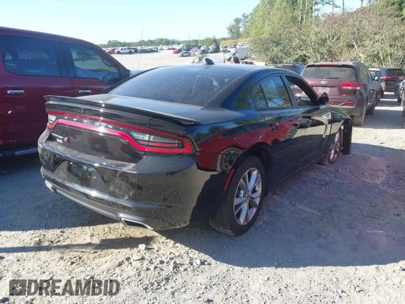 ✅ 2022 Dodge Charger SXT • VIN: 2C3CDXJG9NH218015 • Lot: 43351337. Listed on IAAI with Not provided. Free auction sales archive from the USA and detailed vehicle history report at DreamBid. Image 4.