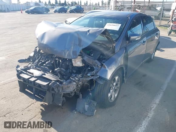 ✅ 2014 Ford Focus SE • VIN: 1FADP3K27EL420850 • Lot: 43610023. Listed on IAAI with Not provided. Free auction sales archive from the USA and detailed vehicle history report at DreamBid. Image 2.