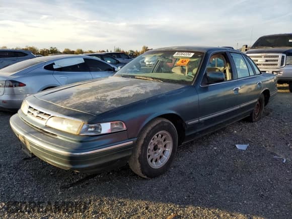 ✅ 1996 Ford Crown Victoria LX • VIN: 2FALP74W0TX129092 • Lot: 80364334. Listed on Copart with 135,563 mi. Free auction sales archive from the USA and detailed vehicle history report at DreamBid. Image 1.
