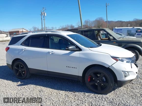 ✅ 2020 Chevrolet Equinox Premier • VIN: 2GNAXXEV6L6282726 • Lot: 43714805. Listed on IAAI with 91,296 mi. Free auction sales archive from the USA and detailed vehicle history report at DreamBid. Image 13.