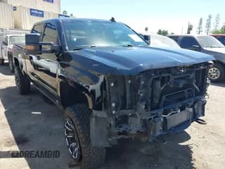✅ 2016 Chevrolet Silverado 2500HD LT • VIN: 1GC1KVE89GF277845 • Lot: 43040037. Listed on IAAI with 56,497 mi. Free auction sales archive from the USA and detailed vehicle history report at DreamBid. Image 1.