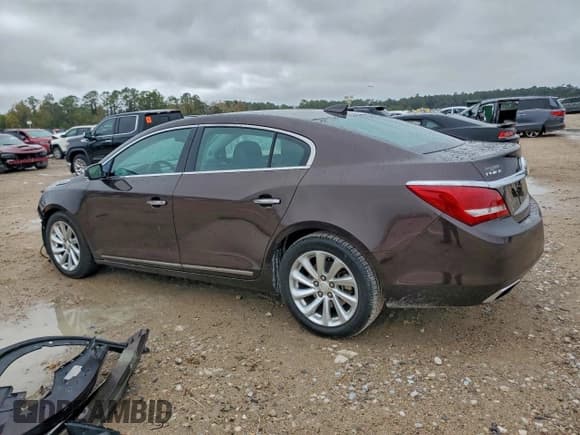 ✅ 2015 Buick LaCrosse Leather • VIN: 1G4GB5G39FF306069 • Лот: 95307135. Опубликован ранее на Copart с пробегом 159 224 миль. Бесплатный доступ к архиву аукционных продаж из США и подробный отчёт об истории автомобиля на DreamBid. Изображение 2.