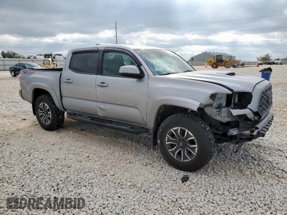 ✅ 2020 Toyota Tacoma TRD Sport • VIN: 3TMCZ5AN4LM317694 • Lot: 92999985. Listed on Copart with 77,904 mi. Free auction sales archive from the USA and detailed vehicle history report at DreamBid. Image 4.