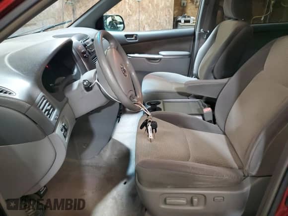 2009 Toyota Sienna LE with VIN 5TDBK23C89S026912, listed as a Copart auction lot 70195815 with 139,796 mi miles and Salvage title. Bid and sale history available at DreamBid. Image 7.