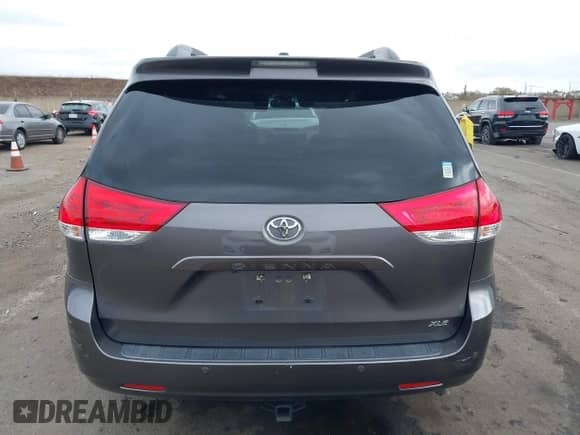2011 Toyota Sienna XLE AAS with VIN 5TDYK3DC8BS059333, listed as a IAAI auction lot 43501915 with 173,775 mi miles and . Bid and sale history available at DreamBid. Image 16.