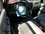 ✅ 2004 Toyota Tacoma PreRunner • VIN: 5TESM92NX4Z370310 • Лот: 66297215. Опубликован ранее на Copart с пробегом 214 345 миль. Бесплатный доступ к архиву аукционных продаж из США и подробный отчёт об истории автомобиля на DreamBid. Изображение 8.