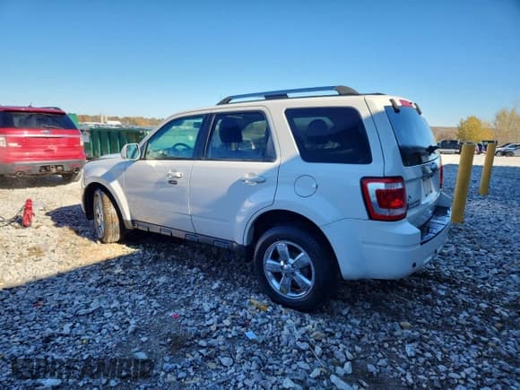 ✅ 2010 Ford Escape Limited • VIN: 1FMCU0EG4AKA45774 • Lot: 90543345. Listed on Copart with 145,843 mi. Free auction sales archive from the USA and detailed vehicle history report at DreamBid. Image 2.