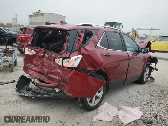 ✅ 2018 Chevrolet Equinox Premier • VIN: 2GNAXMEVXJ6166845 • Лот: 86436465. Опубликован ранее на Copart с пробегом 124 524 миль. Бесплатный доступ к архиву аукционных продаж из США и подробный отчёт об истории автомобиля на DreamBid. Изображение 3.