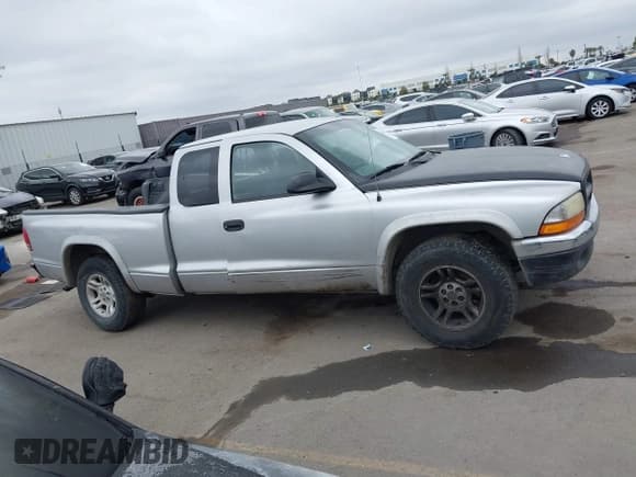 ✅ 2003 Dodge Dakota SLT • VIN: 1D7HL42X83S269082 • Lot: 41890813. Wystawiony na IAAI z przebiegiem Nie podano. Bezpłatny archiwum sprzedaży aukcyjnych z USA i szczegółowy raport historii pojazdu na DreamBid. Zdjęcie 14.