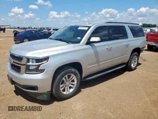 ✅ 2019 Chevrolet Suburban LS • VIN: 1GNSCGKC7KR314122 • Lot: 66214015. Listed on Copart with 111,592 mi. Free auction sales archive from the USA and detailed vehicle history report at DreamBid. Image 1.