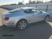 ✅ 2013 Bentley Continental GT • VIN: SCBFT7ZA1DC085265 • Лот: 76097134. Опубликован ранее на Copart с пробегом 14 756 миль. Бесплатный доступ к архиву аукционных продаж из США и подробный отчёт об истории автомобиля на DreamBid. Изображение 3.