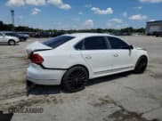 ✅ 2013 Volkswagen Passat SEL • VIN: 1VWCH7A38DC002698 • Lot: 68760795. Listed on Copart with 204,275 mi. Free auction sales archive from the USA and detailed vehicle history report at DreamBid. Image 3.