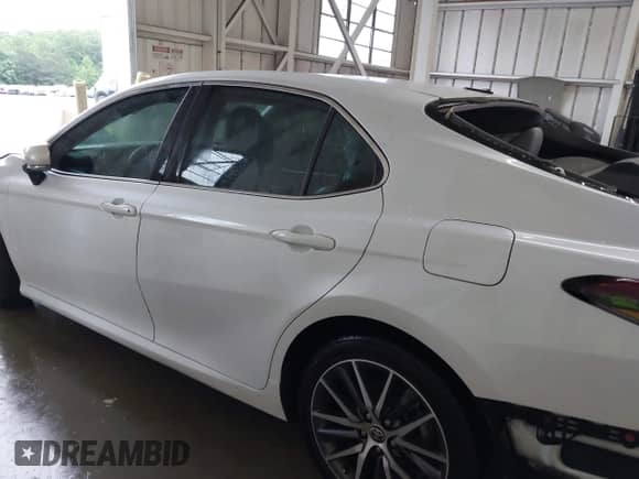 2022 Toyota Camry Hybrid XLE with VIN 4T1F31AK4NU572580, listed as a IAAI auction lot 42244158 with 69,247 mi miles and . Bid and sale history available at DreamBid. Image 14.