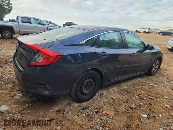 ✅ 2016 Honda Civic LX • VIN: 19XFC2F52GE034524 • Lot: 84631585. Listed on Copart with 124,514 mi. Free auction sales archive from the USA and detailed vehicle history report at DreamBid. Image 3.