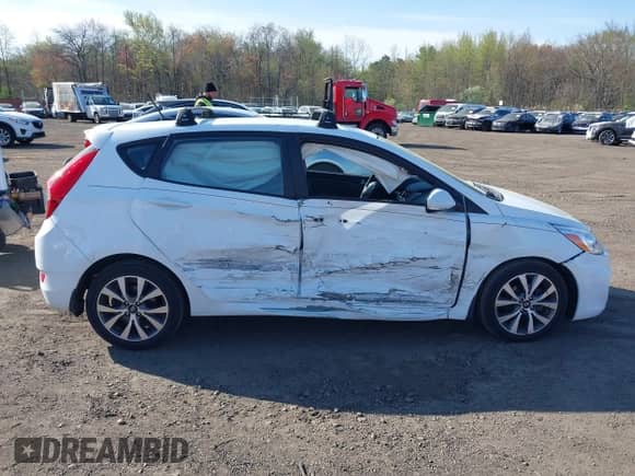 2017 Hyundai Accent Sport with VIN KMHCU5AE4HU336243, listed as a IAAI auction lot 42071434 with 89,345 mi miles and . Bid and sale history available at DreamBid. Image 13.