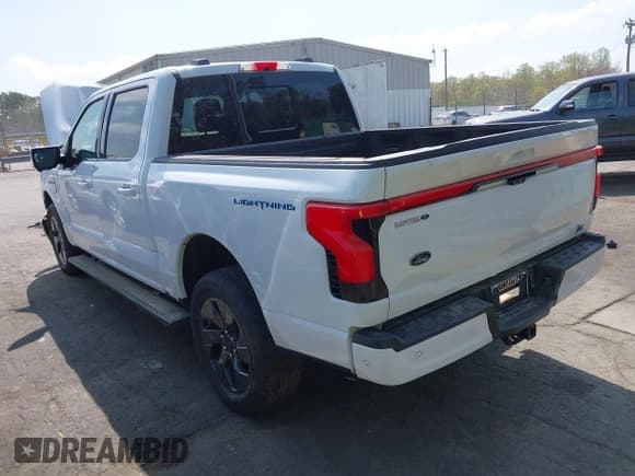 ✅ 2023 Ford F-150 Lightning Pro • VIN: 1FTVW1EV1PWG17610 • Lot: 41929636. Listed on IAAI with 44,428 mi. Free auction sales archive from the USA and detailed vehicle history report at DreamBid. Image 3.