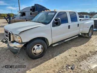 ✅ 2001 Ford F-350 XL • VIN: 1FTWW32FX1EC38048 • Lot: 93839575. Listed on Copart with 339,799 mi. Free auction sales archive from the USA and detailed vehicle history report at DreamBid. Image 1.