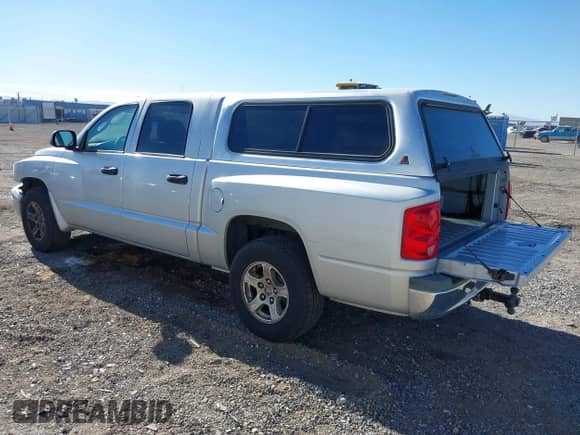 2006 Dodge Dakota SLT with VIN 1D7HE48N46S556925, listed as a IAAI auction lot 41169757 with 158,667 mi miles and . Bid and sale history available at DreamBid. Image 3.
