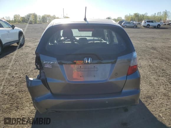 ✅ 2013 Honda Fit • VIN: LUCGE8H3XD3004182 • Лот: 84290895. Опубликован ранее на Copart с пробегом 157 415 миль. Бесплатный доступ к архиву аукционных продаж из США и подробный отчёт об истории автомобиля на DreamBid. Изображение 6.