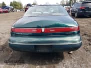 ✅ 1993 Lincoln Mark VIII • VIN: 1LNLM91V6PY718157 • Лот: 49493195. Опубликован ранее на Copart с пробегом 129 889 миль. Бесплатный доступ к архиву аукционных продаж из США и подробный отчёт об истории автомобиля на DreamBid. Изображение 6.