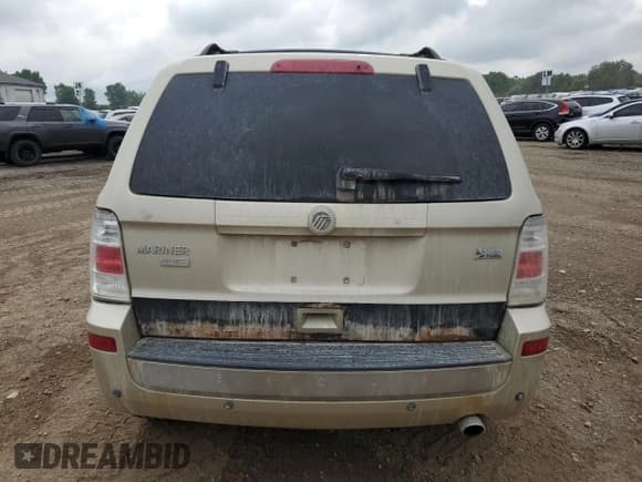 ✅ 2010 Mercury Mariner Premier • VIN: 4M2CN8HG2AKJ03385 • Lot: 66471005. Listed on Copart with 141,423 mi. Free auction sales archive from the USA and detailed vehicle history report at DreamBid. Image 6.