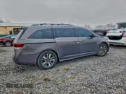 ✅ 2014 Honda Odyssey Touring • VIN: 5FNRL5H92EB056545 • Lot: 93947975. Listed on Copart with 98,901 mi. Free auction sales archive from the USA and detailed vehicle history report at DreamBid. Image 3.