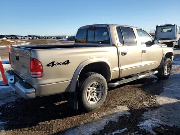 ✅ 2003 Dodge Dakota SLT • VIN: 1D7HG48N03S258538 • Lot: 88070715. Wystawiony na Copart z przebiegiem 137 616 mil. Bezpłatny archiwum sprzedaży aukcyjnych z USA i szczegółowy raport historii pojazdu na DreamBid. Zdjęcie 3.