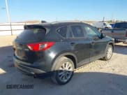 ✅ 2014 Mazda CX-5 Grand Touring • VIN: JM3KE2DY7E0345255 • Lot: 43668720. Listed on IAAI with 270,412 mi. Free auction sales archive from the USA and detailed vehicle history report at DreamBid. Image 4.