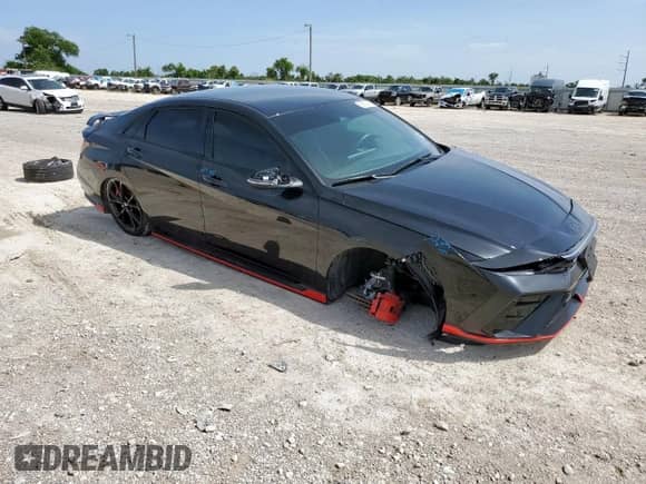 ✅ 2024 Hyundai Elantra • VIN: KMHLW4DK6RU021113 • Lot: 65016915. Listed on Copart with 13,819 mi miles. Access the free auction sales archive from the USA and view a detailed vehicle history report at DreamBid. Image 4.