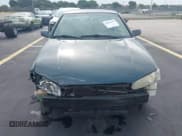 ✅ 1997 Toyota Camry LE • VIN: 4T1BG22K2VU075437 • Lot: 42643361. Listed on IAAI with 195,403 mi. Free auction sales archive from the USA and detailed vehicle history report at DreamBid. Image 12.