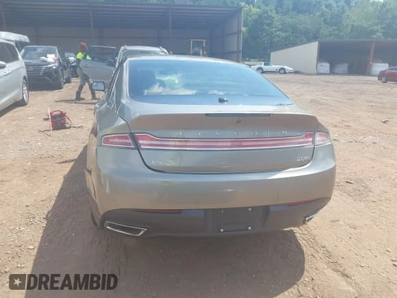 ✅ 2016 Lincoln MKZ Hybrid • VIN: 3LN6L2LU3GR633819 • Lot: 43009523. Wystawiony na IAAI z przebiegiem 263 758 mil. Bezpłatny archiwum sprzedaży aukcyjnych z USA i szczegółowy raport historii pojazdu na DreamBid. Zdjęcie 6.