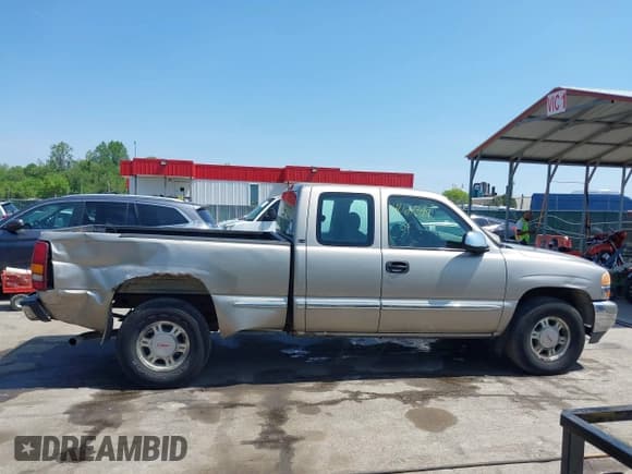 ✅ 2001 GMC Sierra 1500 SLE • VIN: 1GTEK19T31E271805 • Лот: 42167399. Опубликован ранее на IAAI с пробегом 206 202 миль. Бесплатный доступ к архиву аукционных продаж из США и подробный отчёт об истории автомобиля на DreamBid. Изображение 13.