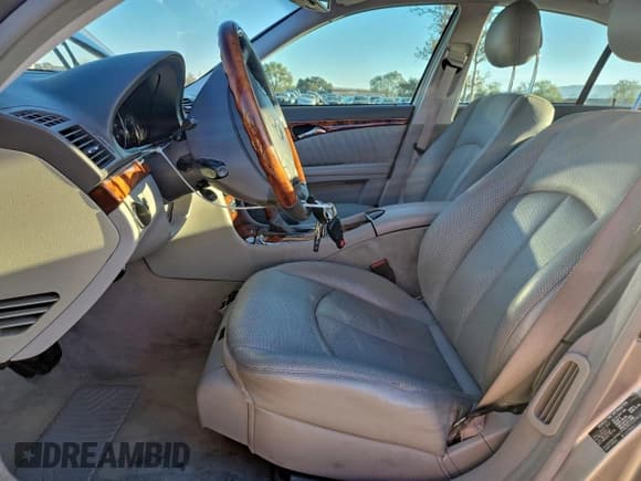 ✅ 2004 Mercedes-Benz E 500 • VIN: WDBUF70JX4A534722 • Lot: 94597075. Listed on Copart with 128,778 mi. Free auction sales archive from the USA and detailed vehicle history report at DreamBid. Image 7.